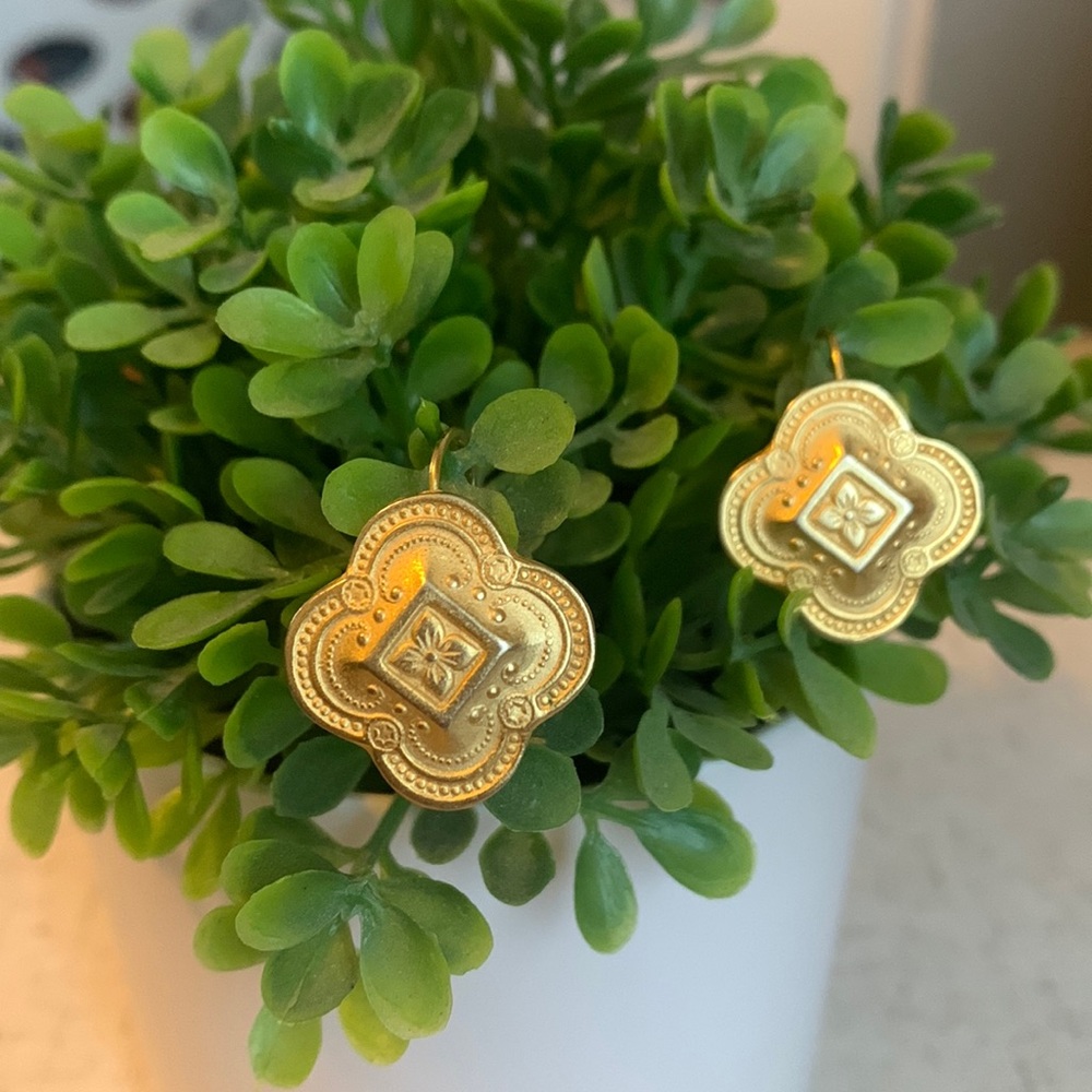 Vintage gold drop earrings with engraved floral details